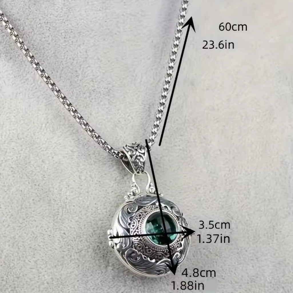 Mrs. Claus diffuser Necklace w/ green gem