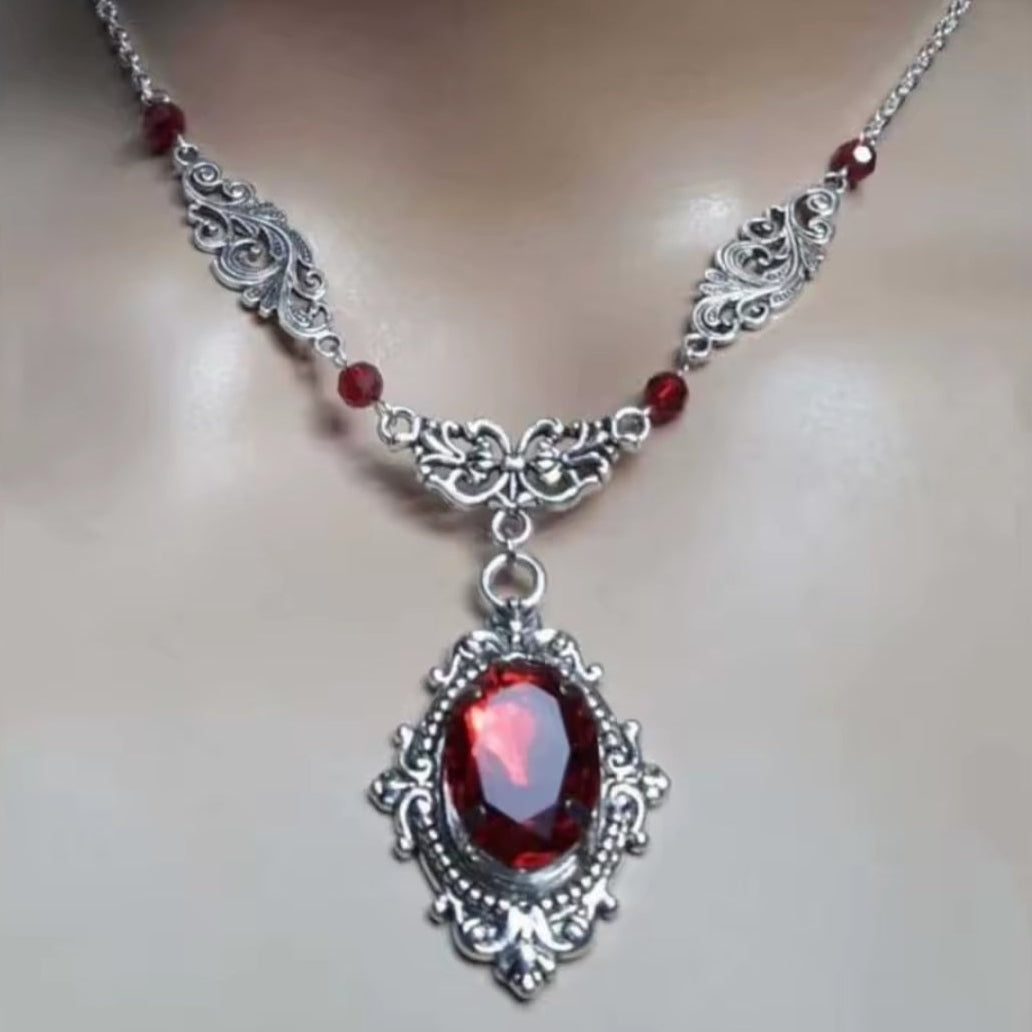 Mrs. Claus Necklace - Silver w/ Red Gem