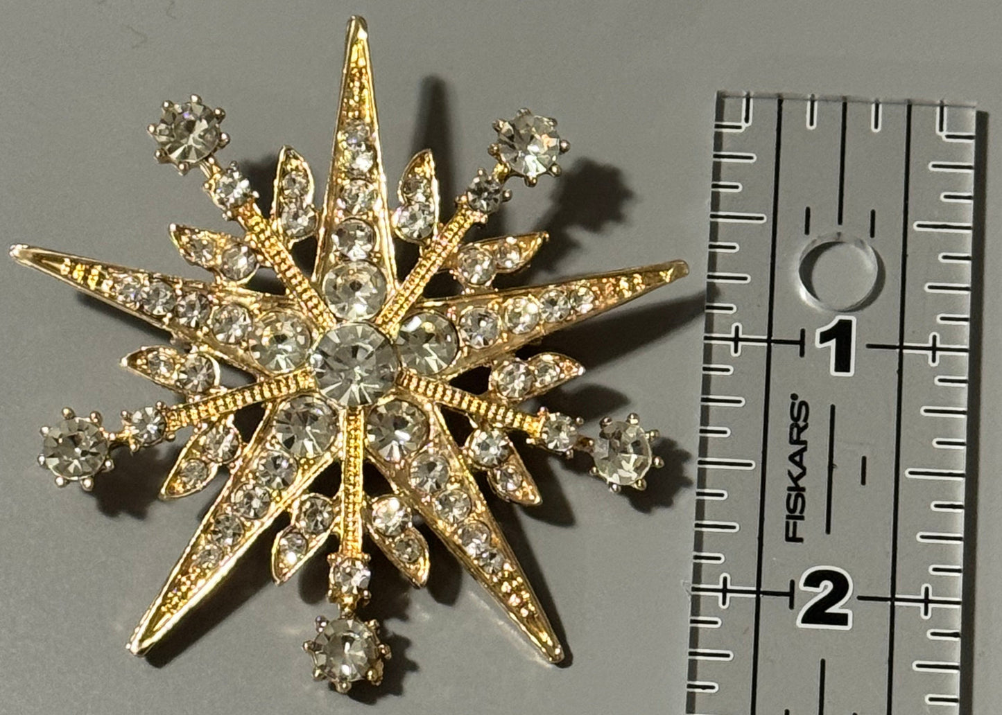 Gold Pointed Snowflake Brooch