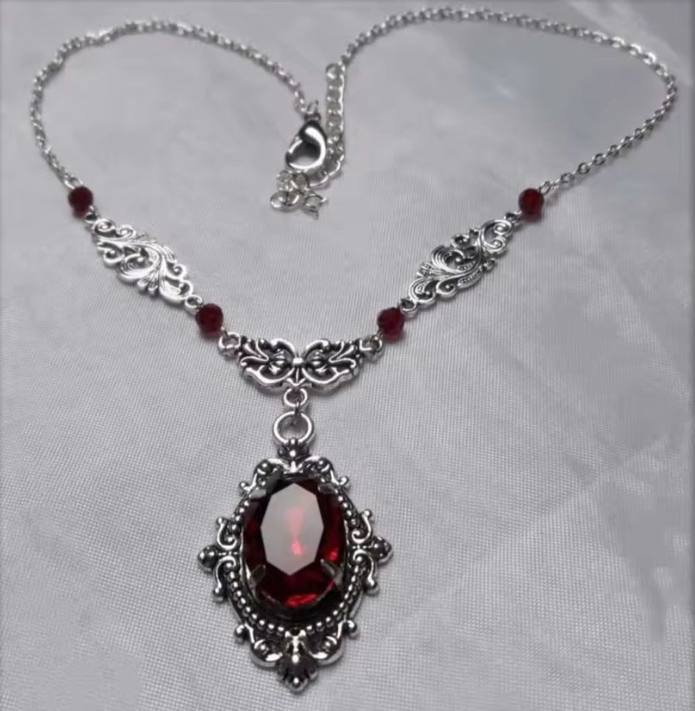 Mrs. Claus Necklace - Silver w/ Red Gem