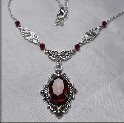 Mrs. Claus Necklace - Silver w/ Red Gem