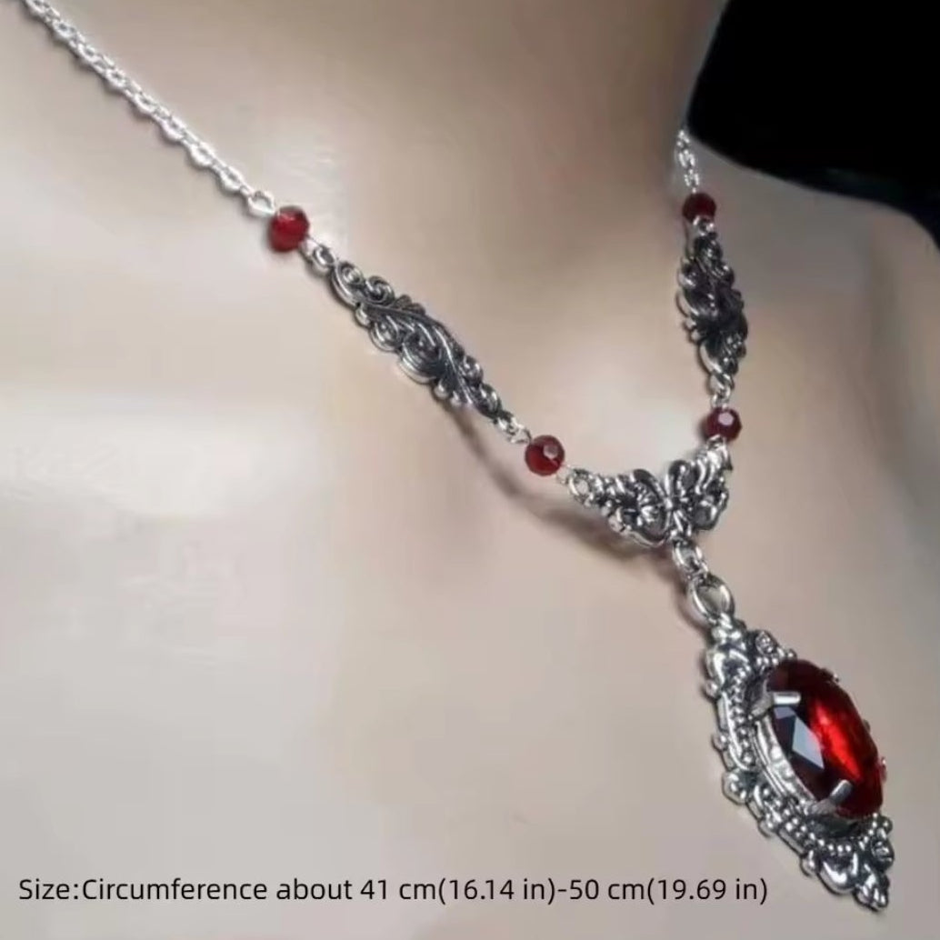 Mrs. Claus Necklace - Silver w/ Red Gem