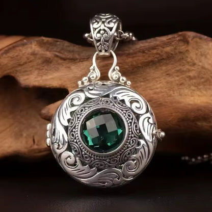 Mrs. Claus diffuser Necklace w/ green gem