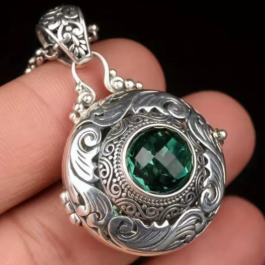 Mrs. Claus diffuser Necklace w/ green gem
